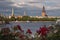 Riga, Latvia / July 31, 2021: Beautiful view of the cathedrals and churches over Daugava river, in Riga capital of the baltic