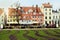 Riga, Latvia. Livu laukums square with colorful townhouses on Meistaru iela street.