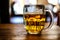 Riga, Latvia - March 28, 2022: Mug of traditional Czech beer Pilsner Urquell seen in a pub