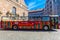 RIGA, LATVIA - MAY 06, 2017: View on the colored excursion tourist bus for hop on hop off tour that is located in the city center