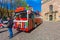 RIGA, LATVIA - MAY 06, 2017: View on the colored excursion tourist bus for hop on hop off tour that is located in the city center