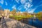 RIGA, LATVIA - MAY 06, 2017: View on the pedestrian bridge in The Park Bastion Hill. building near Latvian National Opera House