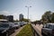 RIGA, LATVIA - MAY 1, 2019: Bicycle parade on Labor day with families and friends on public space road with other cars