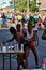 Riga, Latvia - May 19 2019: Three female Elite runners finding their sports drink from table during marathon