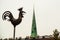 Riga, Latvia: Sculpture of a rooster on a spire in the center of the old city. Church of St. Peter