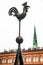 Riga, Latvia: Sculpture of a rooster on a spire in the center of the old city. Church of St. Peter