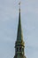 Riga, Latvia: Spire Church of St. Peter is one of the symbols and one of the main sights of the city of Riga. Golden pawn on top