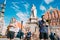 Riga Latvia Street Music Trio Band, Three Young Guys Playing Instruments For Donation On The Town Hall Square