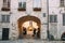 Riga Latvia. Three Young People With Guitar In Arch Of Swedish Gate