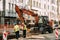 Riga, Latvia. Workers are engaged in repairing communications on the Aleksandra Caka street with an excavator