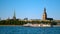 Riga Old Town panorama with big cruise ship cutter passing by on Daugava river