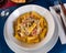 Rigatoni alla carbonara in cream cheese sauce with pancetta