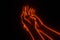 Right hand holding press left hand close up fire glowing 3d effect view