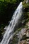 Right side view of Sutov waterfall, one of the tallest waterfalls in Slovakia, during summer season.