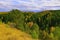 The right slope of the Sylva river valley with rocky gypsum outcrops in autumn decoration