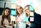 That right there ladies is our winning formula. a group of businesswomen arranging sticky notes on a glass wall in a