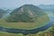 Rijeka CrnojeviÄ‡a, part of the Skadar Lake in Montenegro. Tourist cruises by boat on the beautiful meanders of the river flowing