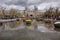 Rijksmuseum National Museum with I Amsterdam sign and tulips in the reflecting pool. Amsterdam,