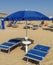 Rimini - Blue open umbrella and sunbeds