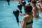 Rimini, Italy - june 2017: Women Doing Water Aerobics with Boxing Speed Ball in an Outdoor Swimming Pool