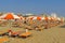 Rimini - White-orange umbrellas and sunbeds