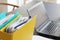 Ring binders  filled with papers in front of laptop computer on table in office space. Selective focus