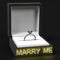 Ring with `marry me` sign