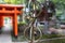 Rings on traditional rain chain, kusaridoi at shrine. Kanazawa, Japan