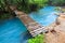 Rio celeste and small wooden bridge