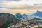 Rio De Janeiro Amazing View, Sugar Loaf Mountain, Urca Hill, Evening Clouds, Sunset. Buildings, Jesus Redeemer Statue And Hills.