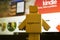 Rio de Janeiro, Brazil - October 17, 2018: Image of an Amazon paper toy in front of notebook presenting Kindle advertising. Amazon