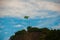 Rio de Janeiro, Lama beach, Brazil: Beautiful landscape with mountain and beach. Flag of Brazil on the mountain