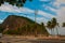 Rio de Janeiro, Lama beach, Brazil: Beautiful landscape with mountain and beach. Flag of Brazil on the mountain