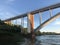 Rio Parana in Foz do Iguacu, separating Brazil from Paraguay. Touristic place in the city of Iguacu Falls. Brazilian flag