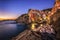 Riomaggiore fisherman village at sunset. Five Lands & x28;Cinque Terre& x29;, Liguria, Italy