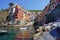 RIOMAGGIORE, ITALY - JULY 20, 2021: Riomaggiore colorful fishing village, seascape in Five lands, Cinque Terre National Park,