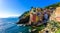 Riomaggiore - Village of Cinque Terre National Park at Coast of Italy. Beautiful colors at sunset. Province of La Spezia, Liguria