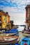 Riomaggiore village street, boats and sea. Cinque Terre, Ligury,