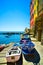 Riomaggiore village street, boats and sea. Cinque Terre, Ligury, Italy