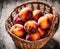 Ripe appetizing nectarine fruits in an overflowing basket, AI