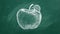 Ripe apple on greenboard