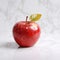 Ripe apple on an original red background