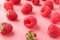 Ripe aromatic raspberries on color background, closeup