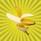 Ripe banana on a yellow background