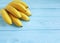 Ripe bananas exotic cleaneating on a blue wooden background