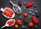 Ripe berry - raspberries, red currants, blueberries, strawberries, hedgehogs and mint leaves