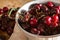 Ripe cherries on rustic wooden background