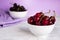 Ripe cherry berries in two white plates, fruit, background