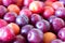 Ripe cherry plum background. Top angle view. Close up. Selective focus. Full frame.