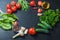 Ripe cherry tomatoes on a branch, parsley, garlic and spices